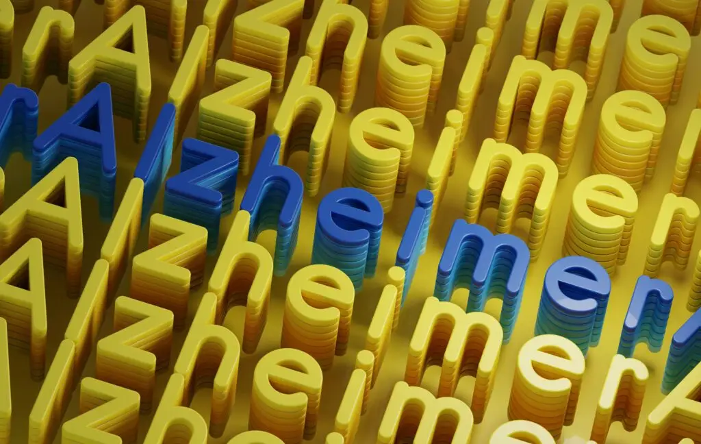 3D letters repeating the word Alzheimer in yellow and blue