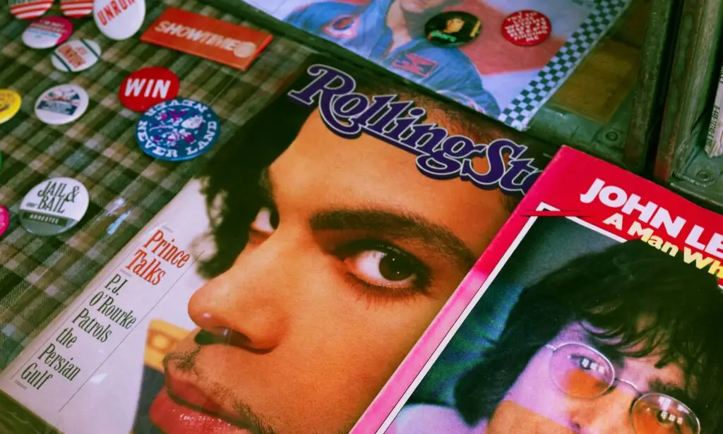 Vintage Rolling Stone magazines and pin-back buttons