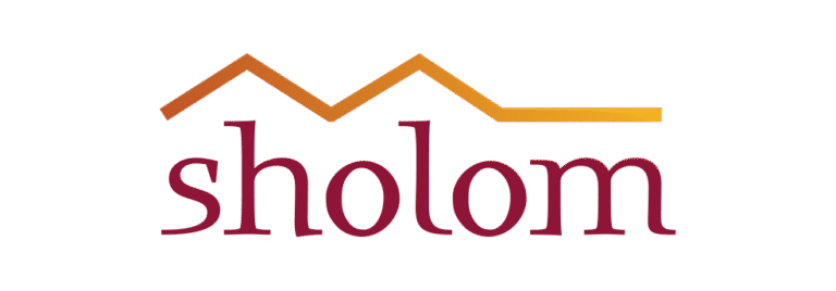 The word “sholom” in bold, maroon lowercase letters with a yellow-orange zigzag line above, resembling rooftops or mountains—reflecting the spirit of estate planning Minnesota—appears on a clean white background.