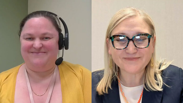 Two women smiling on a video call discuss supported decision-making; the woman on the left has brown hair tied back, wears a headset and yellow cardigan, while the woman on the right has blonde hair, glasses, and a navy blazer.