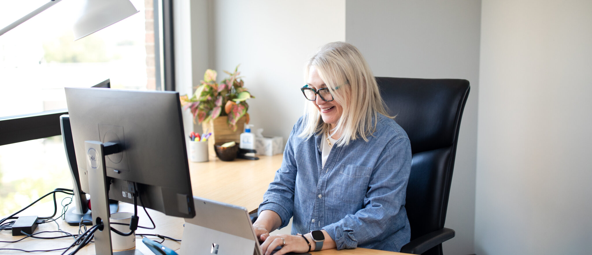 Everbright Legacy Law team member working at her desk in the Richfield office